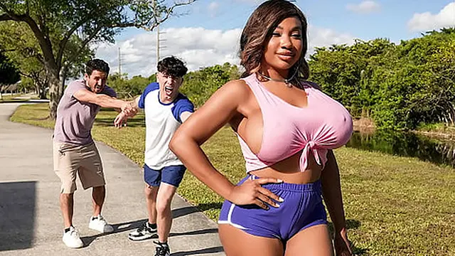 Busty Tiamaria Engages in a Greasy Threesome with Two Peepers!