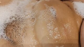 Tanned big tits stepsister in bathroom playing with pussy and tits