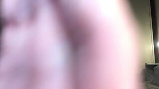 Masturbating until she orgasms —  big-assed white woman with big tits