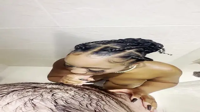 Curvy amateur beauty swallows cock in steamy shower scene