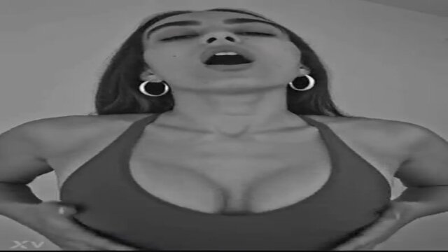 Petite GF plays with her massive jugs while masturbating