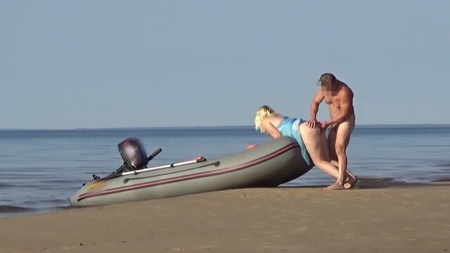 Blonde OLDER WOMAN gives a oral and shows off her round backside at the beach