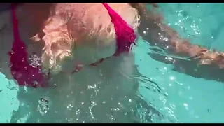 Busty Artemisia Love showcases her perfection in a micro bikini underwater
